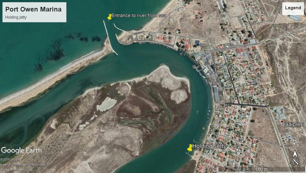 Google maps aerial view of river entrance and holding jetty for port owen