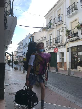 Young man carrying a backpack